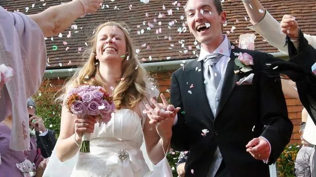 Wedding confetti bride and groom